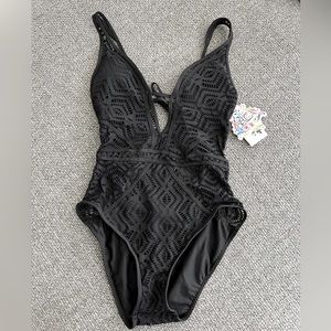 BECCA one piece swimsuit. Size Medium. Black.